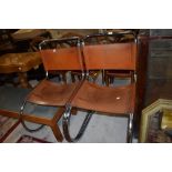 A lovely pair of mid century designer chairs, Chromed framed, leather seats/backs, probably P E L