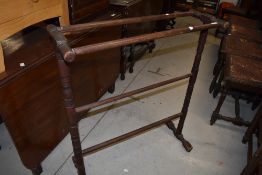 An antique turned frame work towel rail or dryer