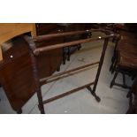 An antique turned frame work towel rail or dryer