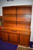 A vintage teak dresser, G Plan or similar, having contrasting detailing, width approx. 142cm