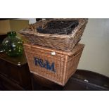 A selection of wicker baskets including Fortnum and Mason picnic hamper