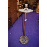 An early 20th Century stained frame candle table