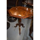 A wine or tea table having turned base with burr walnut veneer top