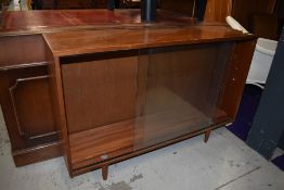 A vintage teak bookcase, labelled Avalon