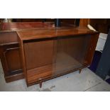 A vintage teak bookcase, labelled Avalon