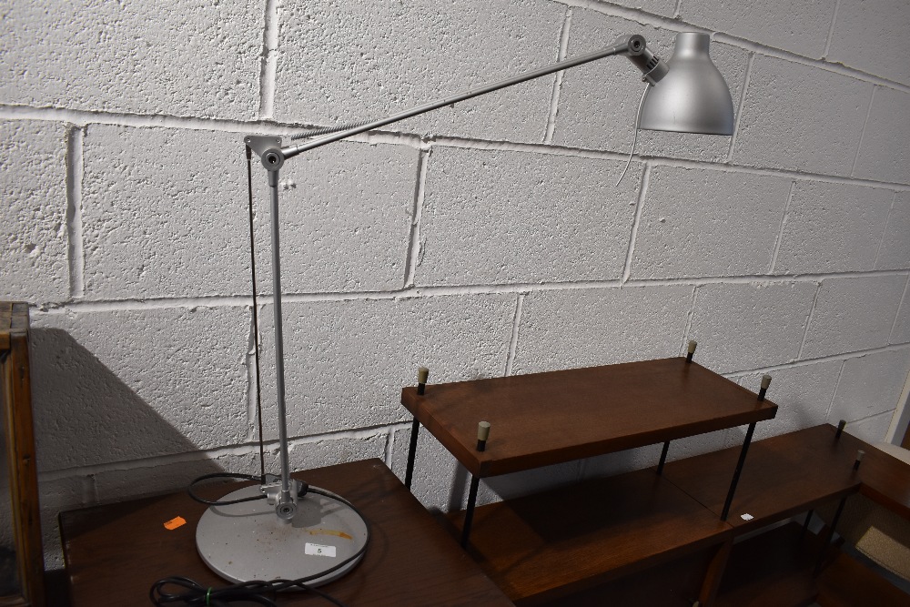 An angle poise lamp