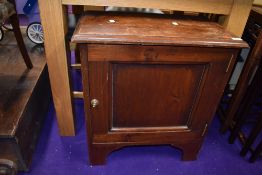 An early 20th Century bedside cabinet