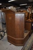 A traditional oak lecturn/rostrum/witness box, with platform