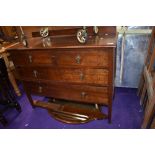 An early 20th Century oak bedroom chest having three long drawers, width approx. 102cm, with