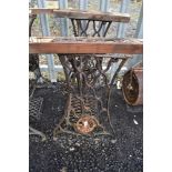 A Victorian cast iron sewing table base