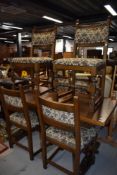 A dining room table and set of six chairs by Old Charm