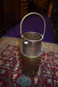 A traditional copper and brass cream kit, approx. Height 40cm to rim