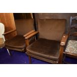 A pair of vintage Parker Knoll easy chairs