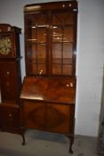 A mahogany glass fronted display or book case bureau