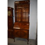 A mahogany glass fronted display or book case bureau