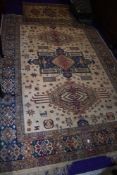 A traditional Persian silk rug and similar prayer mat