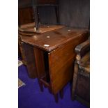 An early to mid 20th Century mahogany gate leg table