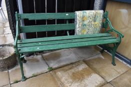 A 1920's cast iron garden bench three seater size