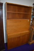 A mid Century part teak bureau bookcase of stylised form, width approx. 91cm