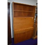 A mid Century part teak bureau bookcase of stylised form, width approx. 91cm