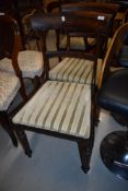 A pair of William IV dining chairs having rose wood backs with turned and carved frames