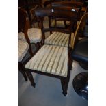 A pair of William IV dining chairs having rose wood backs with turned and carved frames