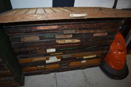 A selection of printer letterpress drawers of various ages all with letter type sets including