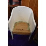 A woven fibre tub chair
