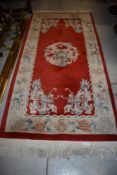 A Chinese style hall way rug with dragon decoration on red ground