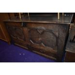 A period oak kist, converted to sideboard with Jacobean style panel doors and drawer to front, width