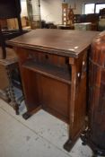 A draughtsman style stand up desk or lectern in pitch pine