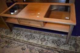 A vintage teak and glass coffee table, labelled G Plan