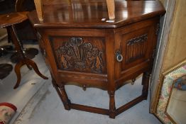 An Old Charm Oak credence or hall way table having carved crest for Lady Diana and Prince Charles