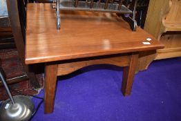 A stained frame coffee table having pitch pine base, square top approx. 61 x 61cm