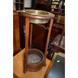 A turn of the century pub or tavern spittoon having coopered base and brass dish