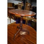 A 19th Century part mahogany pedestal table having later circular top, approx diameter 66cm