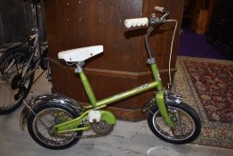 A vintage Childs Raleigh bicycle (small rider)