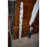 A surveyors or land managers level ruler