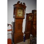 An impressive sized grandfather long case clock by Owen Leeds painted face dial and mahogany case