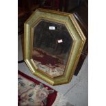 A bevel edged hall way mirror