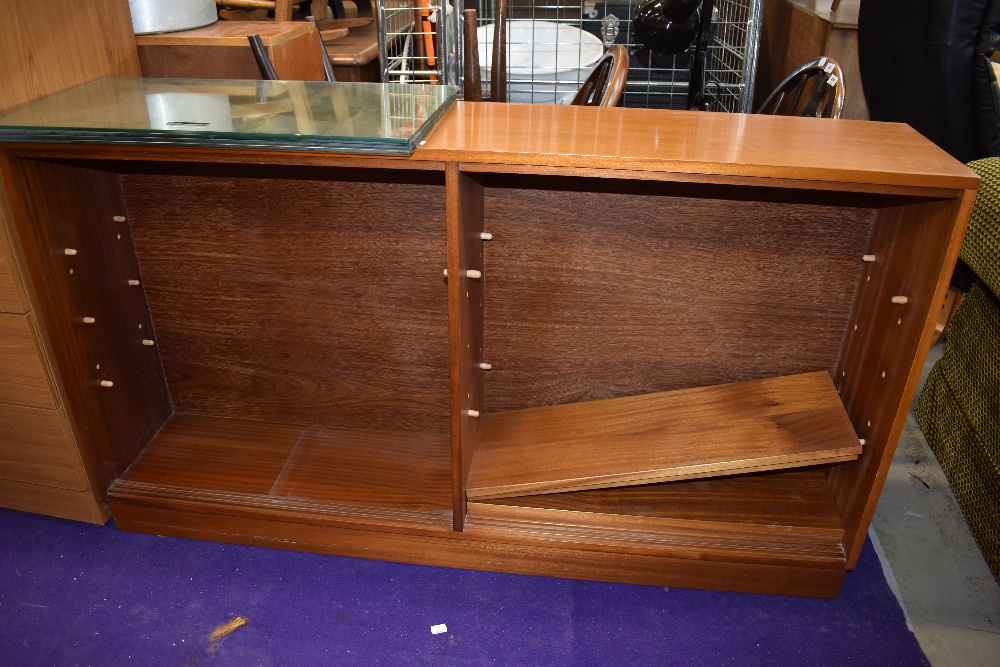 A vintage teak low bookcase