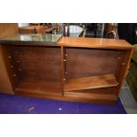 A vintage teak low bookcase