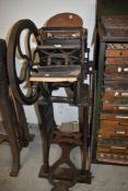 An industrial printers letter type set printing press by Peerless