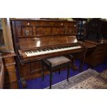 A 19th Century walnut cased upright piano , labelled for J G Irmler, Leipzig, and a stained frame