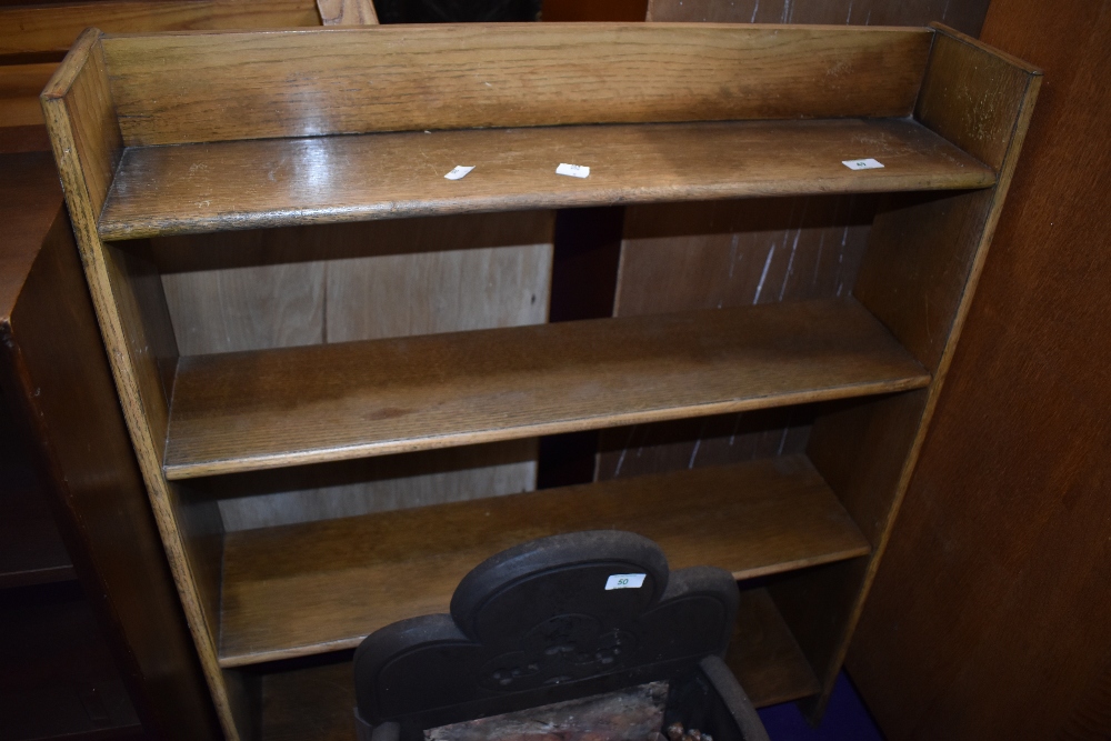 A vintage oak open bookshelf