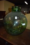 A green glass carboy