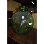 A green glass carboy