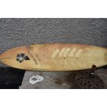 A vintage Rockit surf board by Phil Clifford ideal for display or light use