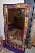 A large wall mirror, with interesting hippy chic style fabric decoration to frame, approx 123 x