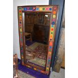 A large wall mirror, with interesting hippy chic style fabric decoration to frame, approx 123 x